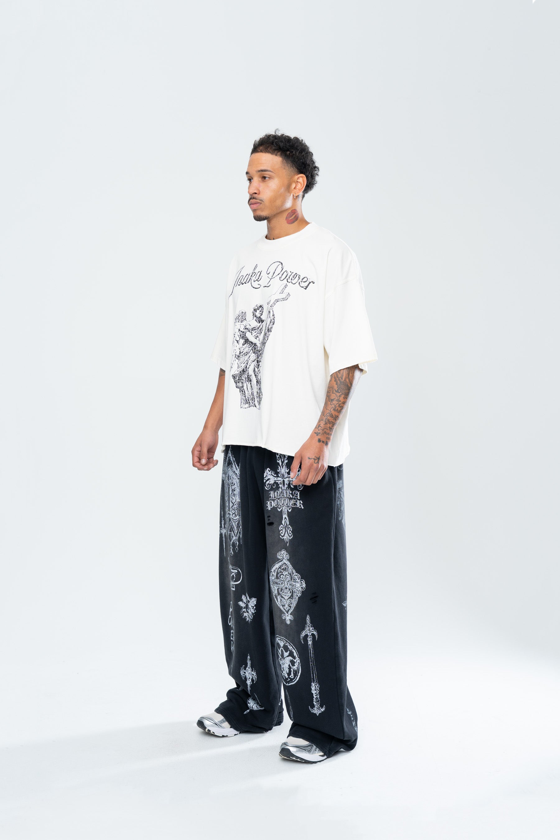CRUCIFIX DISTRESSED BAGGY SWEATPANTS - BLACK