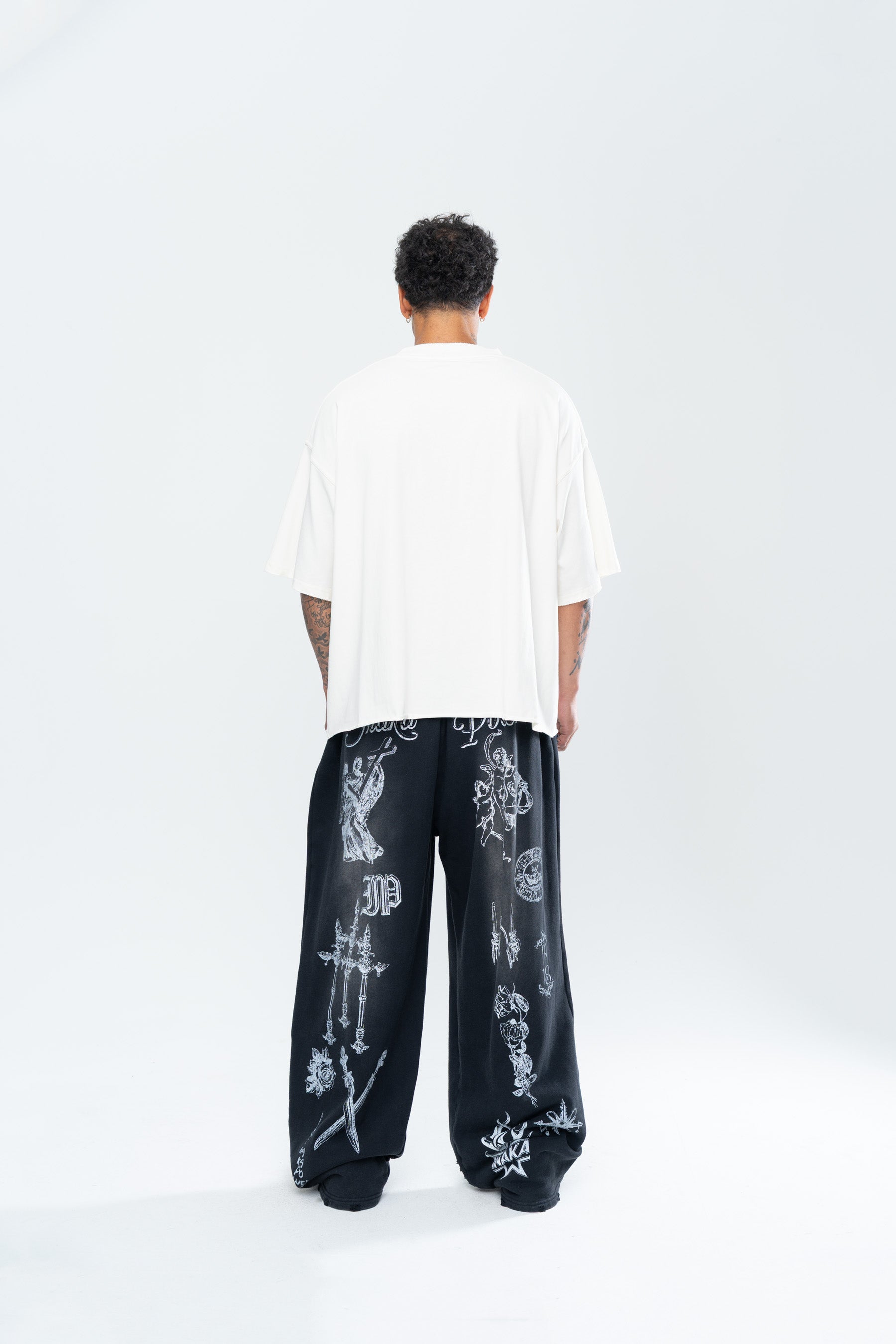 CRUCIFIX DISTRESSED BAGGY SWEATPANTS - BLACK