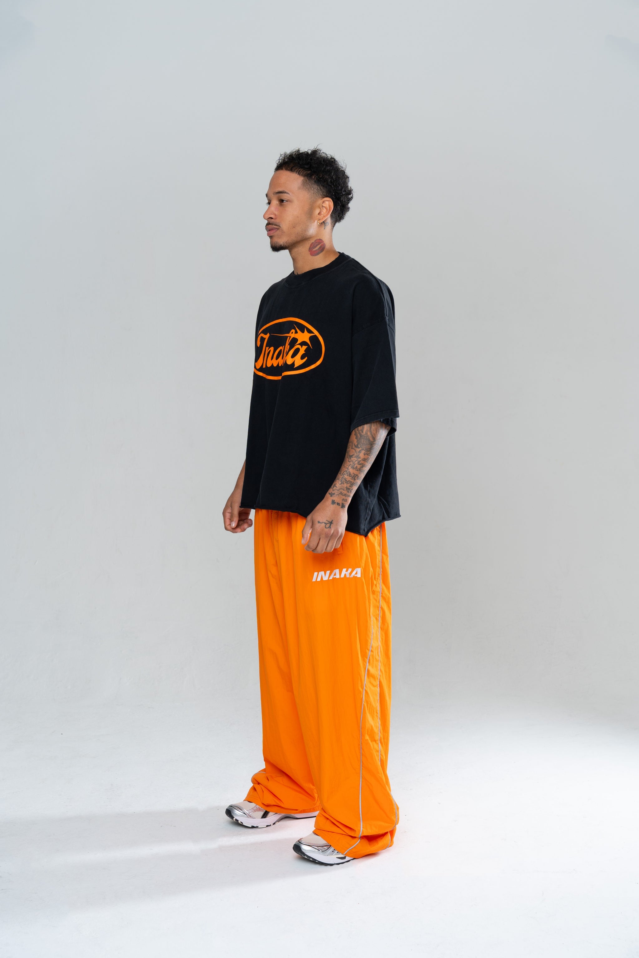 ICONIC BAGGY TRACKPANTS - ORANGE