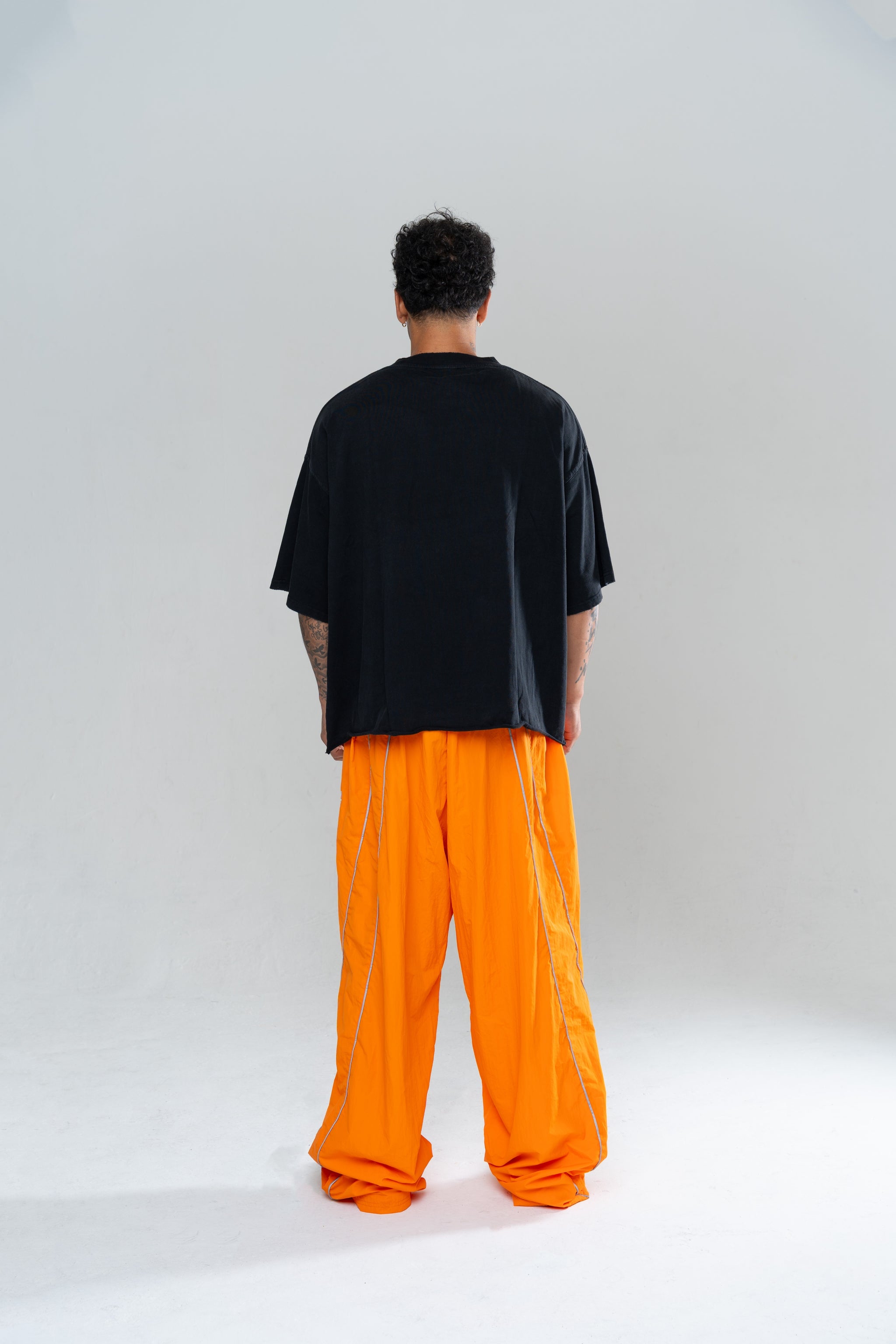 ICONIC BAGGY TRACKPANTS - ORANGE