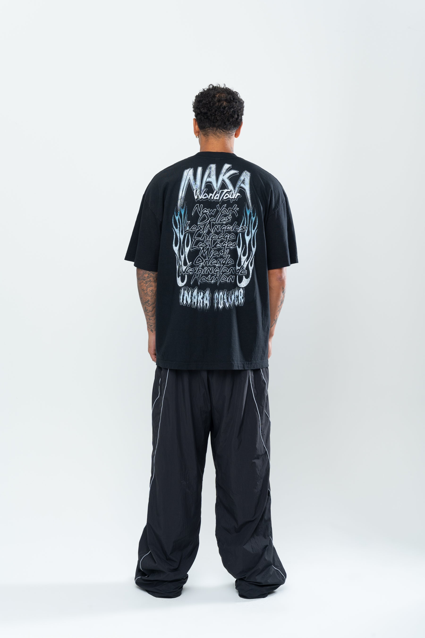 INAKA SAINT TOUR TEE - BLACK