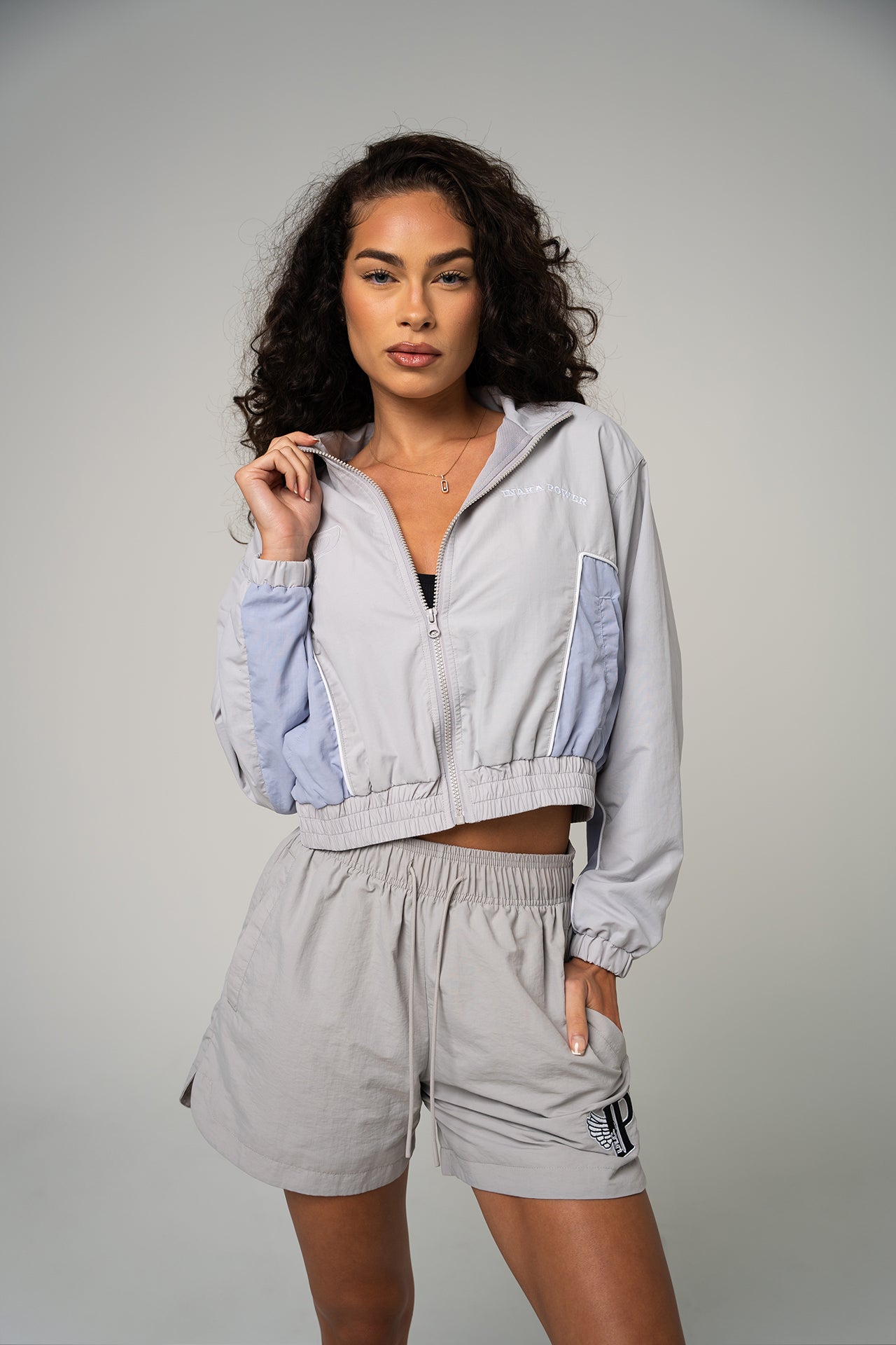 WOMEN'S RUNNING WINDBREAKER - LIGHT BLUE
