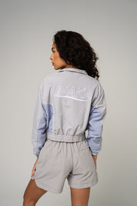 WOMEN'S RUNNING WINDBREAKER - LIGHT BLUE