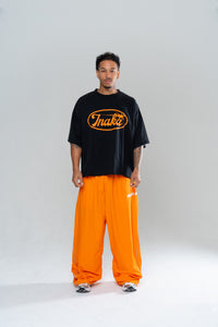 ICONIC BAGGY TRACKPANTS - ORANGE