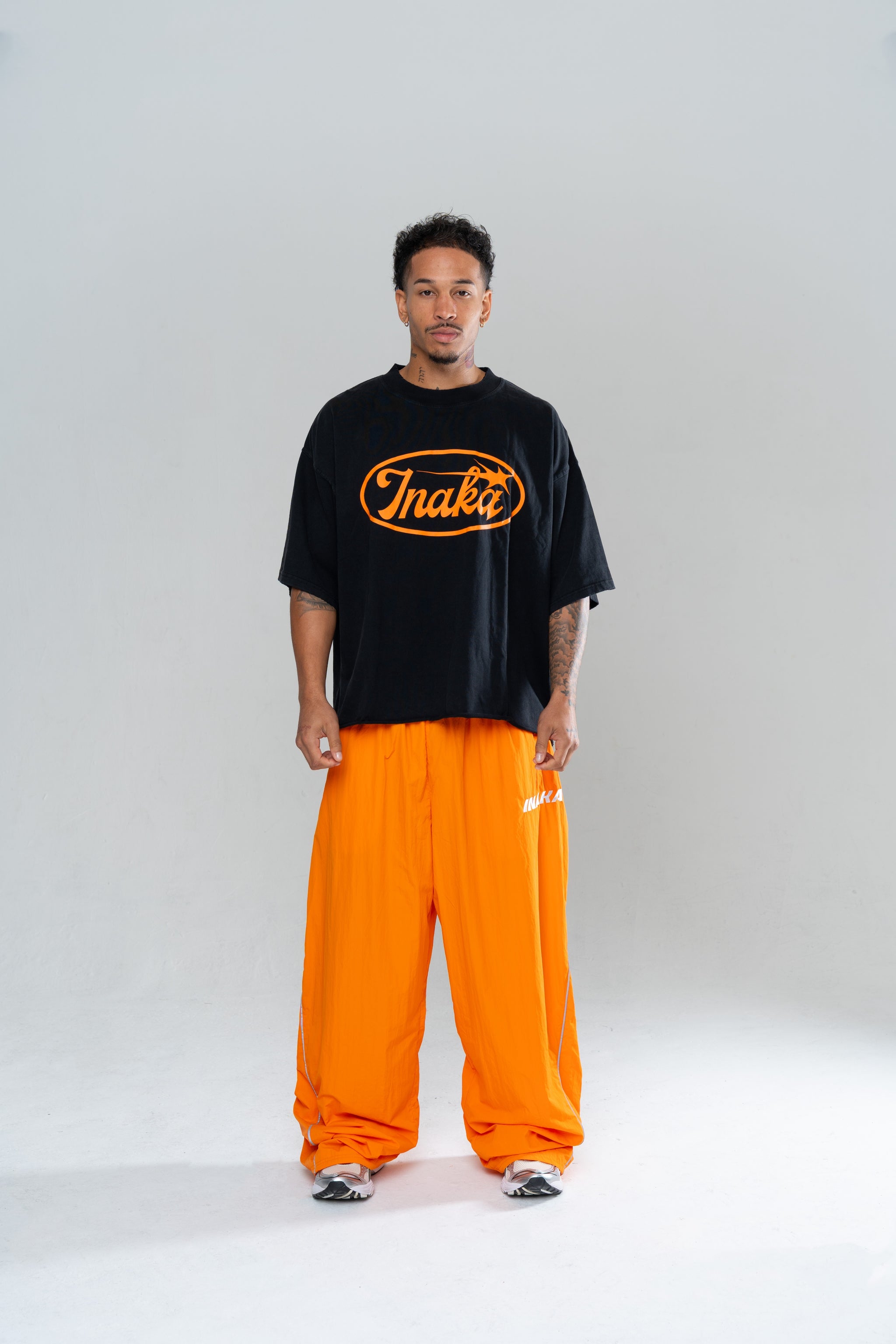 ICONIC BAGGY TRACKPANTS - ORANGE