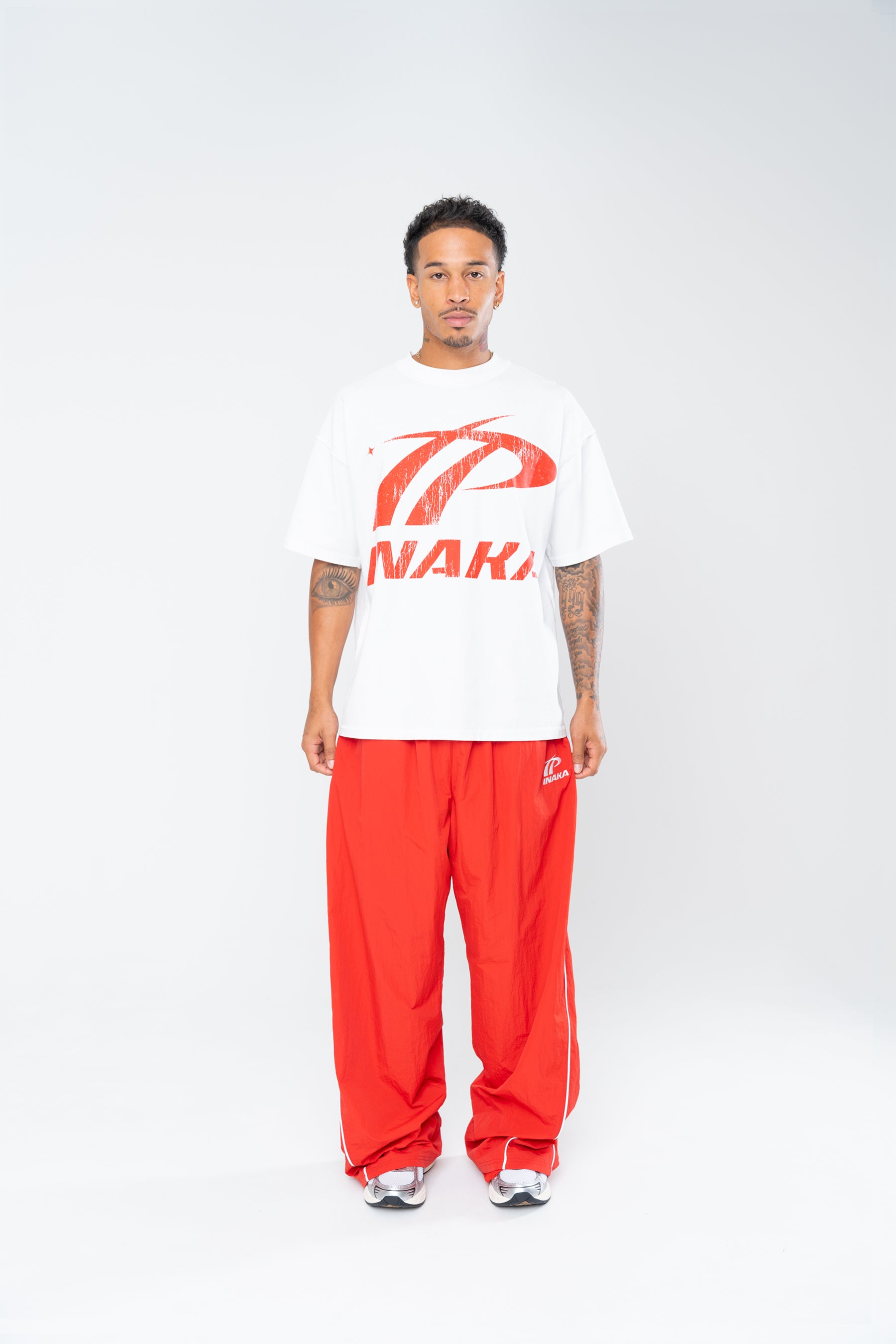 SPORTSWEAR BAGGY TRACK PANTS - RED