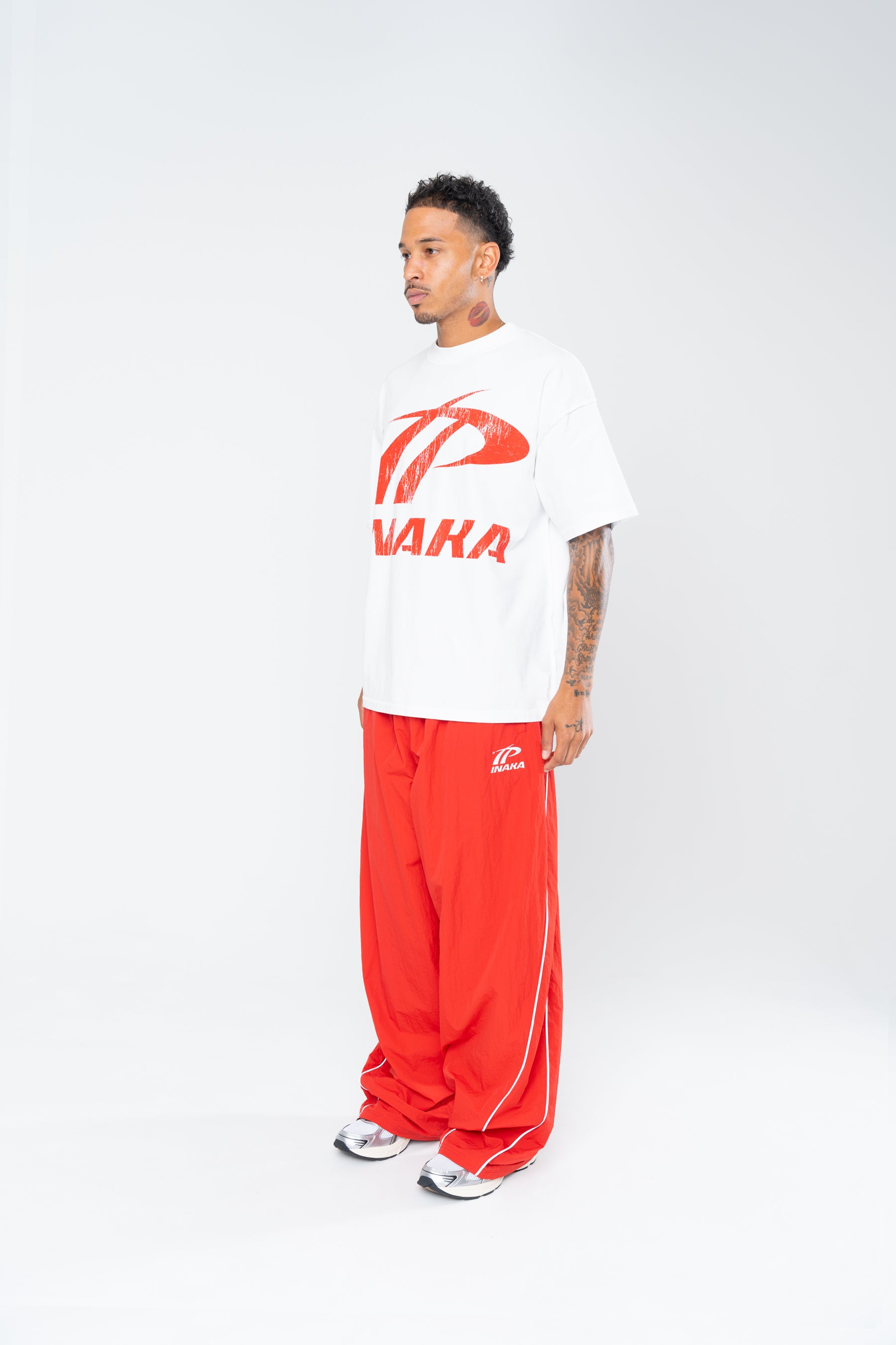 SPORTSWEAR BAGGY TRACK PANTS - RED