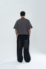 POWERSHOT DISTRESSED BAGGY SWEATPANTS